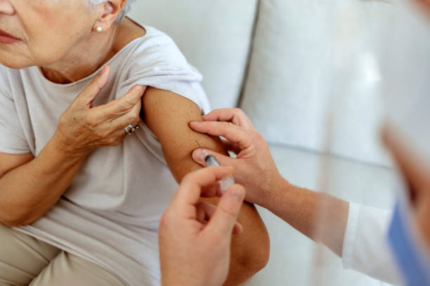 elderly patient getting shingles vaccination