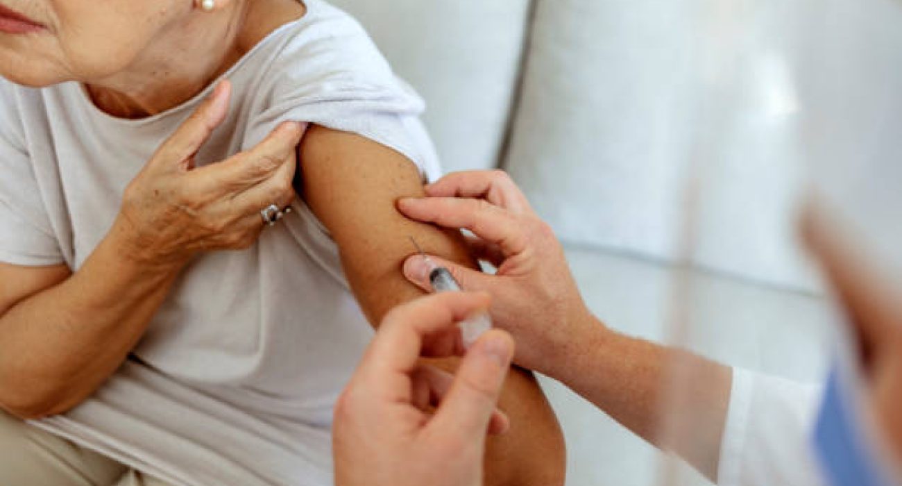 elderly patient getting shingles vaccination